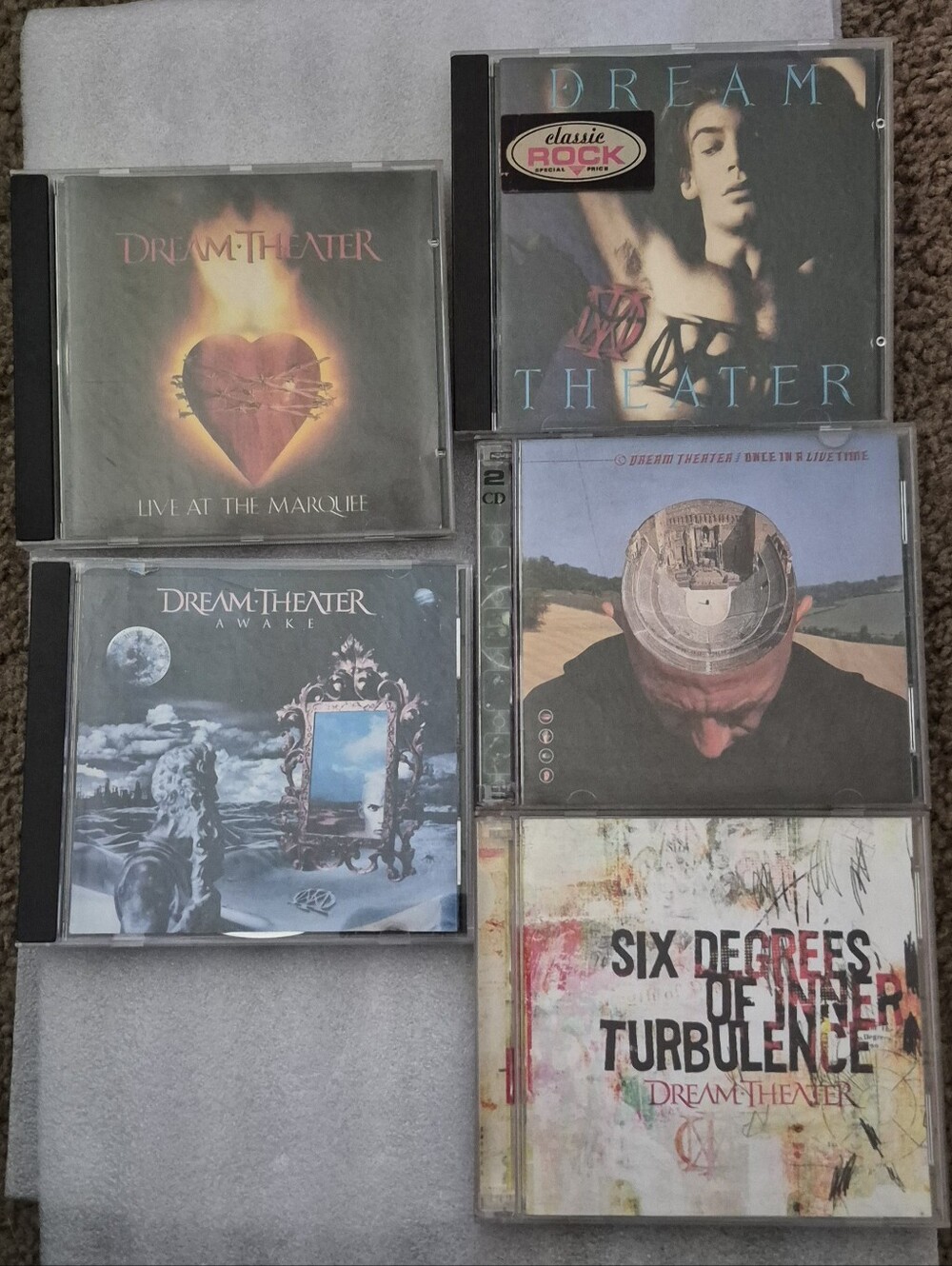 5 cd 7 discs all in good condition. Outer jewel cases have scratches due to age,
